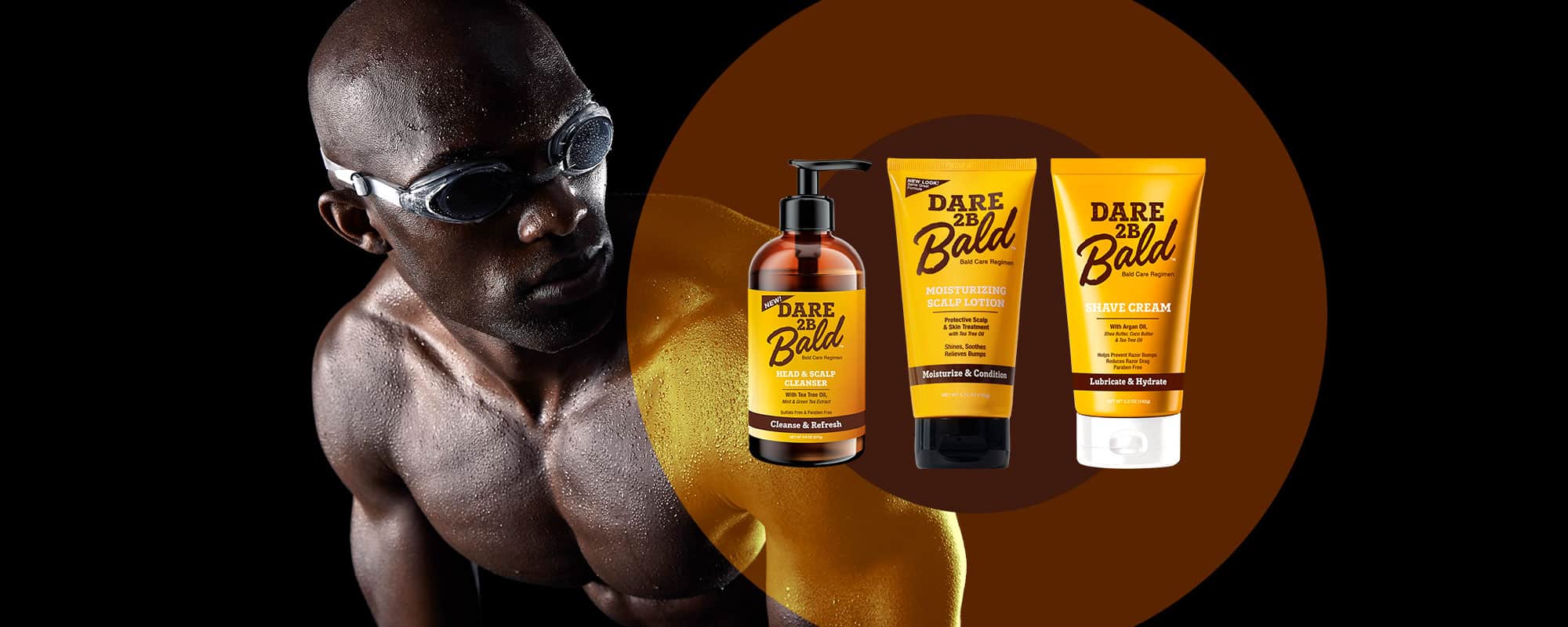 Man with a bald head wearing swim goggles and 'Dare to Be Bald' hair care products on a brown background