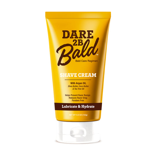 Yellow tube of Dare 2B Bald Shave Cream on a white background